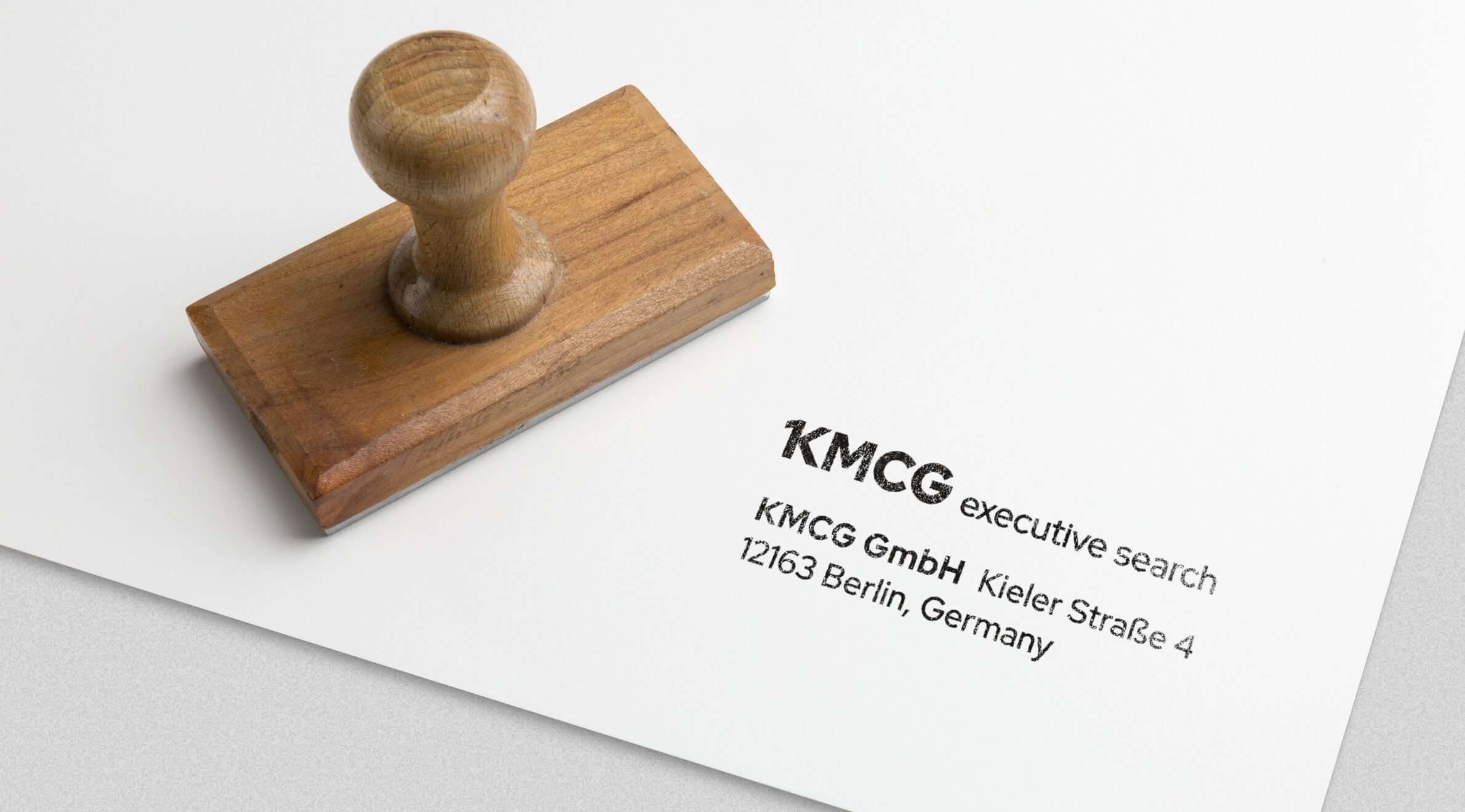 KMCG Executive Search, Geschäftsausstattung - Stempel